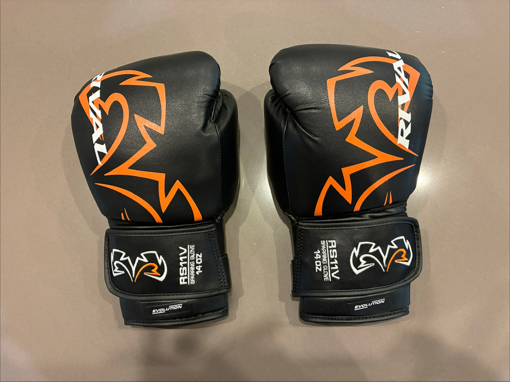 RIVAL RS11V Evolution Sparring Gloves - Black & Orange