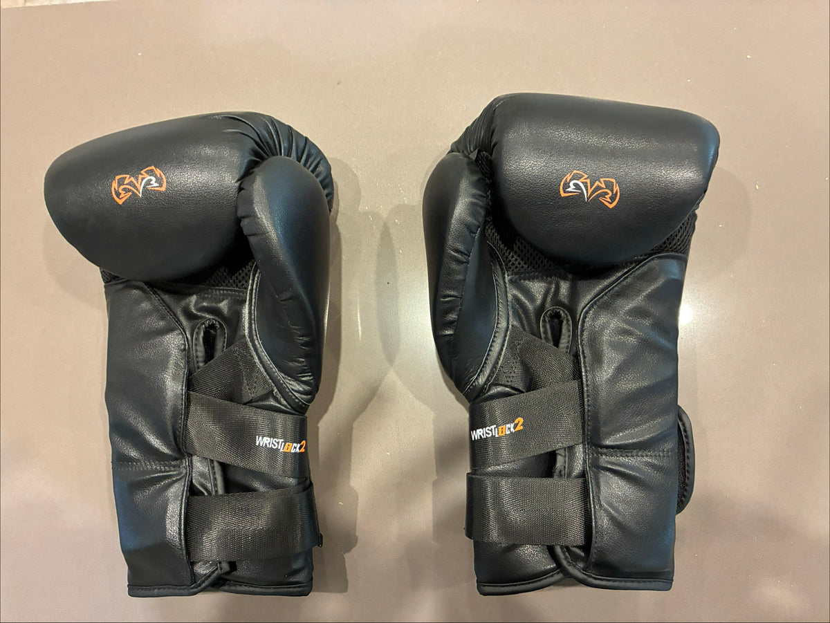 RIVAL RS11V Evolution Sparring Gloves - Black & Orange
